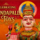 Decorative poster with the text “Celebrating Kondapalli Toys” featuring a traditional figurine